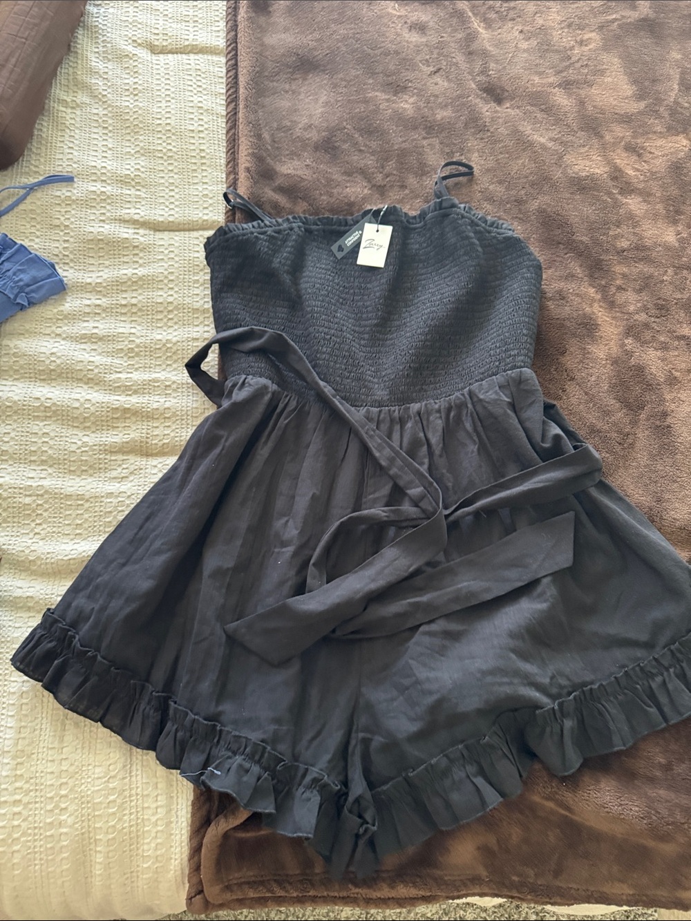 Smocked Black Ruffle-Hem Romper with Waist Tie